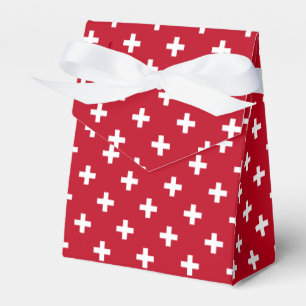 Weißer Polka kreuzt auf rot Geschenkschachtel