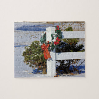 Weißer Zaun mit einem Bow-Puzzle Puzzle