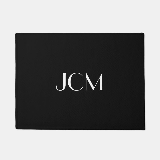 Weißes Anfangsmonogramm auf schwarz Fußmatte (Vorderseite)