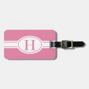 Weißes Band und ovales Schild mit Monogramm Gepäckanhänger