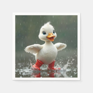 Weißes Duckling in einer Regenpuppe Serviette
