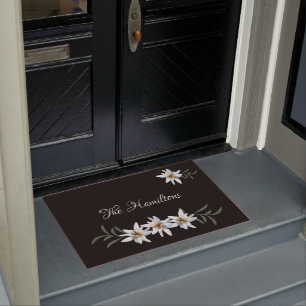Weißes Edelweiß auf schwarz Fußmatte