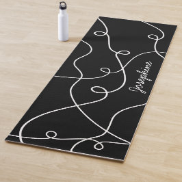 Weißes geometrisches Schleifenmuster auf schwarzem Yogamatte