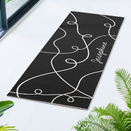 Weißes geometrisches Schleifenmuster auf schwarzem Yogamatte