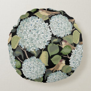 Weißes, hellblaues Hortensia mit grünen Blätter un Rundes Kissen