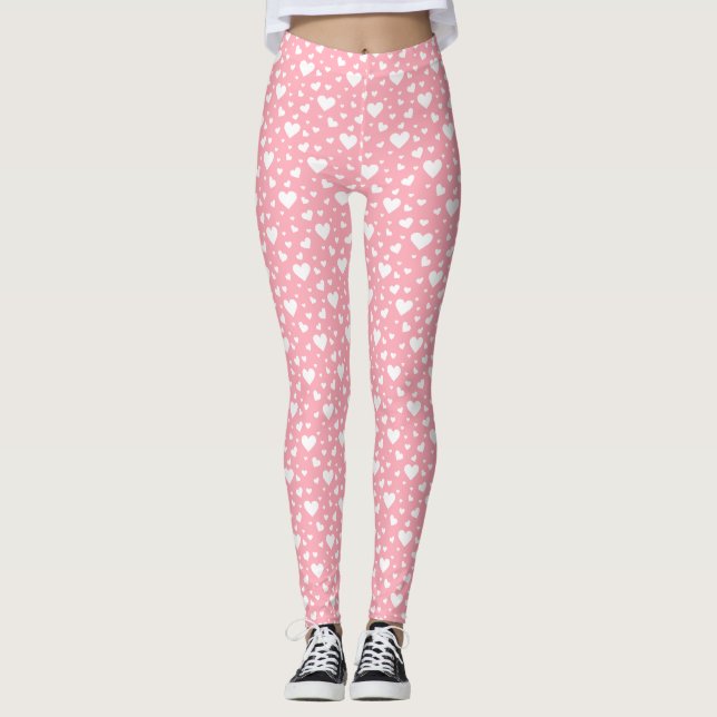Weißes Herzmuster auf rosa Leggings (Vorderseite)