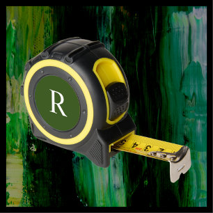 Weißes Monogramm für ein Geschenkwerkzeug für eine Maßband