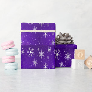 Weißes Schneeflocken und blaues Hintergrundpapier Geschenkpapier