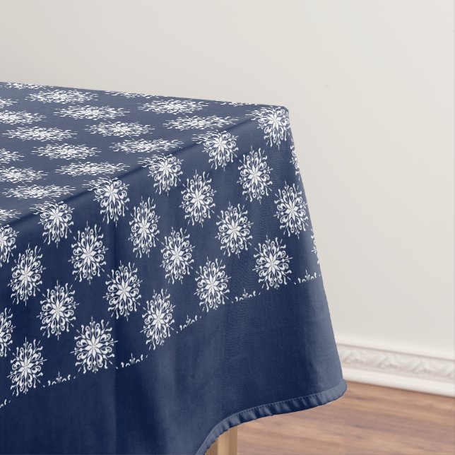 Weißes Schneeflockenmuster auf einem mitternachtsb Tischdecke (Beispiel)