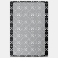 Weißes Totenkopf mit gekreuzter Knochengraphik