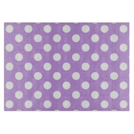 Weißpolka-Punkte auf Lila Schneidebrett