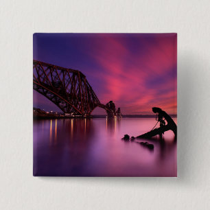 Weiter Schienen-Brücke an Sonnenuntergang Button