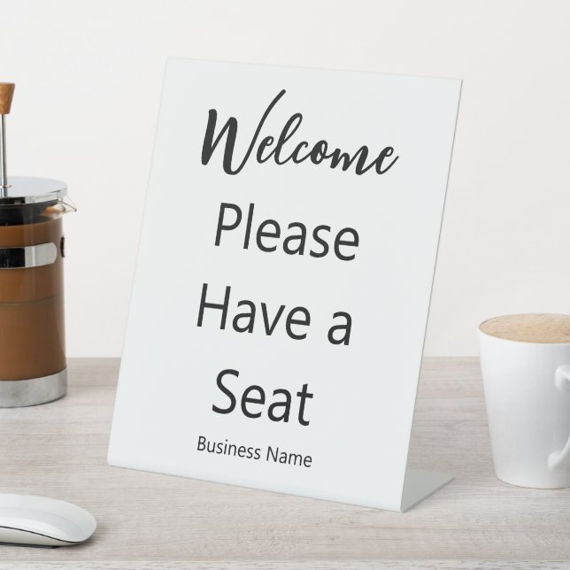 Welcome Please Have a Seat Business Name White Sockelschild (In SItu)