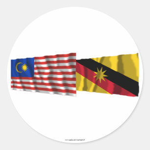 Wellenartig bewegende Flaggen Malaysias u. Runder Aufkleber
