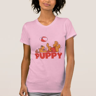 Welpe spielt T-Shirts und Geschenke