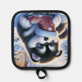 Welpenspiel mit schneebedecktem Winterboot Topflappen