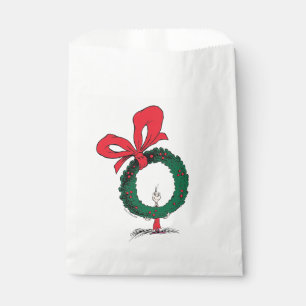 Wer späht durch den Weihnachtskranz Geschenktütchen