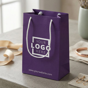 Werbeaktion für Lila Firmenlogos Kleine Geschenktüte
