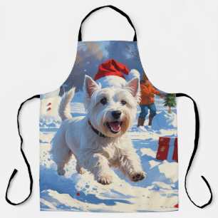 Westie läuft im Schnee mit Weihnachtsmütze Schürze