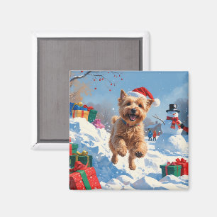 Wheaten Terrier läuft im Schnee mit Weihnachtshut Magnet