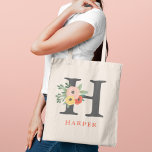 Whimsical Blush Coral Floral Personalized Monogram Tragetasche<br><div class="desc">Elegant custom tote bag features a whimsical fall floral bouquet design with colorful watercolor flowers, leaves, and greenery in shades of blush pink, golden yellow, coral orange red, and green. Personalize the dark gray and orange red text with a first name and initial. Makes a unique gift for your bridesmaids...</div>