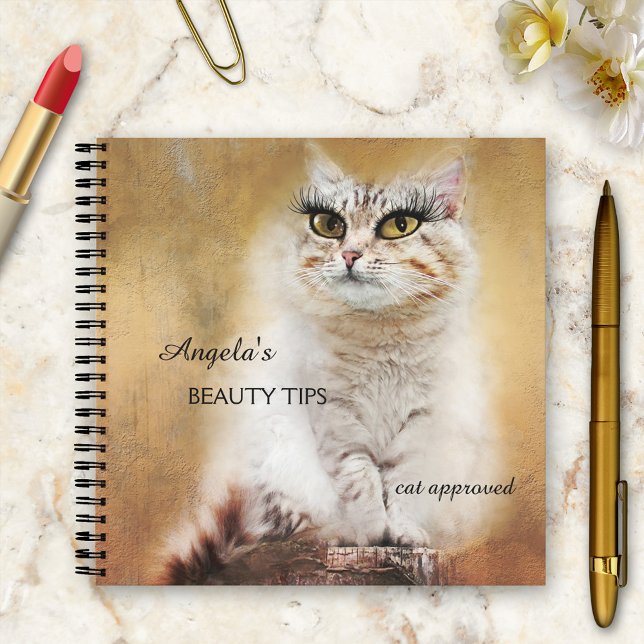 Whimsical Girly Funny Cat Notebook Notizbuch (A funny whimsical notebook featuring a gold colored painting of a cat princess with makeup)