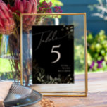 Whimsical Greenery und Gold | Schwarze Tischnummer<br><div class="desc">Treten Sie ein in eine Welt der Zauber mit unserem kichen Grün und Gold | Schwarze Tischnummer, perfekt für Ihren botanischen Frühling boho Hochzeitsempfang. Die Tischnummer ist mit einem schlauen grünen Eukalyptus und goldenen Akzenten geschmückt und strahlt Eleganz und moderne Laune aus. Stellen Sie sich einen Spaziergang durch einen zauberhaften...</div>