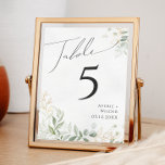 Whimsical Greenery und Gold | TISCHNUMMER<br><div class="desc">Treten Sie ein in eine Welt der Zauber mit unserem kichen Grün und Gold | Tischnummer, perfekt für Ihren botanischen Frühling boho Hochzeitsempfang. Die Tischnummer ist mit einem schlauen grünen Eukalyptus und goldenen Akzenten geschmückt und strahlt Eleganz und moderne Laune aus. Stellen Sie sich einen Spaziergang durch einen zauberhaften Sommergarten...</div>