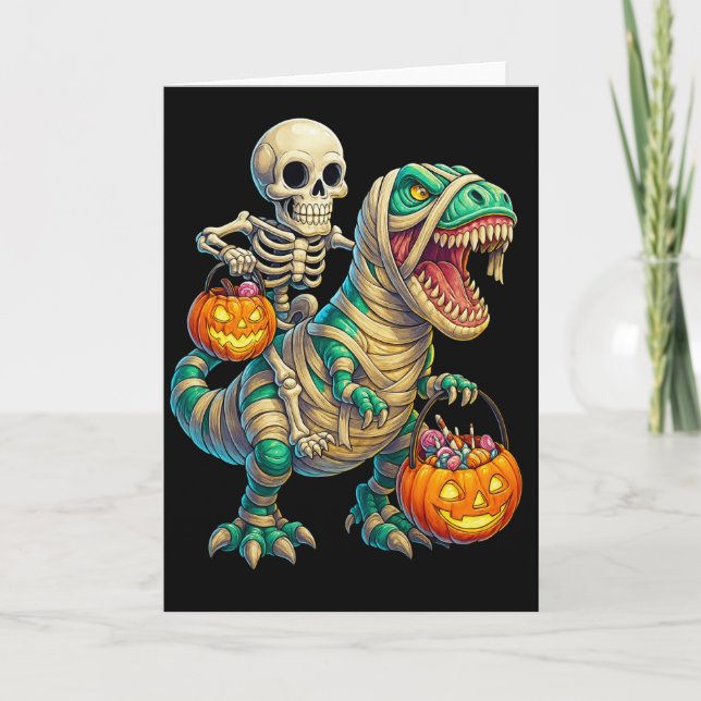 Whimsical Skeleton Riding Mummy T-Rex Halloween Karte (Vorderseite)