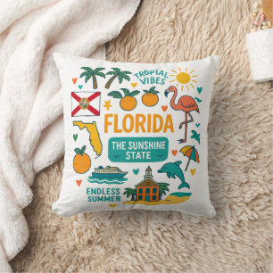 Whimsische Retro-Reiseikonen Floridas Kissen