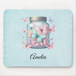 Whimsische Schmetterlinge in einem Glas Mousepad