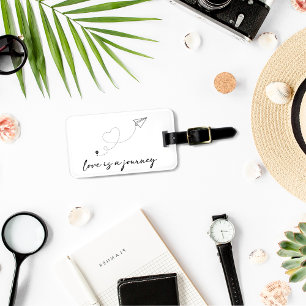 Whimsistische Liebe ist eine Reise in Schwarz und  Gepäckanhänger