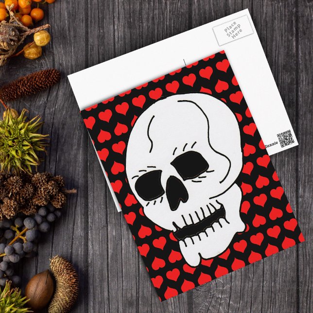 White Classic Skull Red Hearts Postkarte (White skull on bright red hearts on black postcard.)