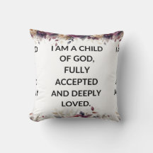 White floral pillow with a simple religious quote
