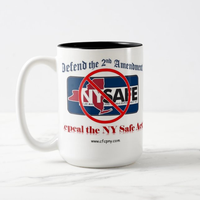 Widerrufen Sie die NY sichere Tat Cofee Tasse (Links)
