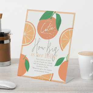Wie groß ist Mama's Bauch Orange Baby Shower Game Sockelschild