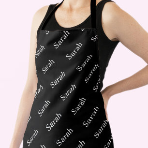 Wiederholter Name oder Word-Muster Schwarz/Weiß Schürze