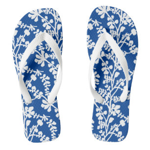 Wiederholtes Muster für blaue und weiße Flora Flip Flops