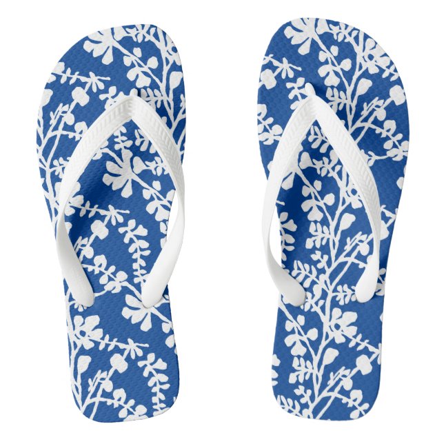 Wiederholtes Muster für blaue und weiße Flora Flip Flops (Fußbett)