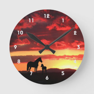Wild Mustang Mare and Foal Silhouette With Sunset Runde Wanduhr