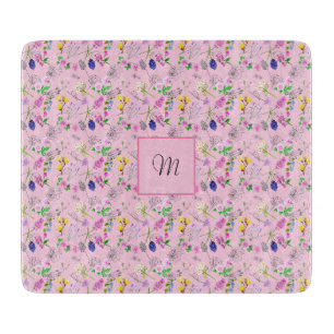 Wilde Blume in Aquarell, auf Rosa. Monogramm Schneidebrett