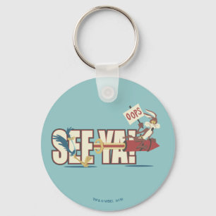 Wile E. Coyote Rocketing Past ROAD RUNNER™ Schlüsselanhänger