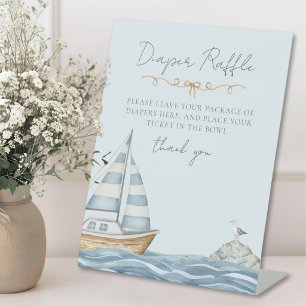 Windel-Raffa bei einer nautischen Babyparty Sockelschild