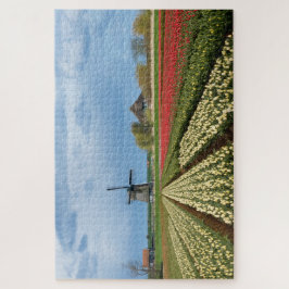 Windmill and tulips landscape in Holland Puzzle