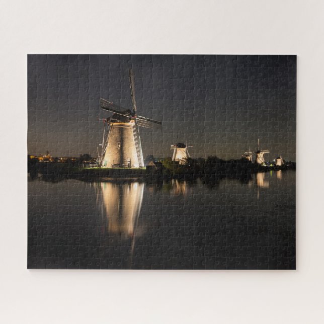 Windmills and water illuminated at night puzzle (Horizontal)
