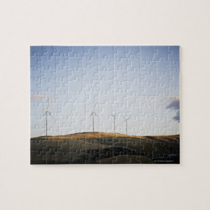 Windmühlen auf Hügel am Sonnenuntergang Puzzle