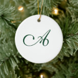 Winter Green Elegant Script Monogram Weihnachten Keramik Ornament<br><div class="desc">Wintergrün elegante Skript monogram Weihnachtsschmuck Keramik. Passen Sie Ihre eigenen Monogramm-Initialen oder das Monogramm-Initial eines Liebsten an,  dem Sie gerade geben. Entworfen,  um unsere Winter Green Weihnachtsmongram Bauble Collection zu passen.</div>