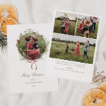 Winter Greenery Wreath Red Bow Foto Feiertagskarte<br><div class="desc">Mit unserer eleganten Weihnachtskarte, die mit einem atemberaubenden Wintergartendesign und klassischer Kalligrafie verziert ist! Wenn Sie eine Ferienkarte suchen, die Eleganz, Luxus und Stil ausstrahlt, dann ist dies die perfekte Karte für Sie. Der Kranrahmen verleiht der Karte eine Touch Vintager Eleganz. Es zeichnet sich durch sein kompaktes, grün und rot-winterbraunes...</div>