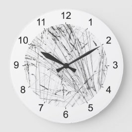 Wintergras im Schnee Große Wanduhr