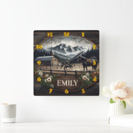 Winterlandschaft mit Pferden und Stall Quadratische Wanduhr